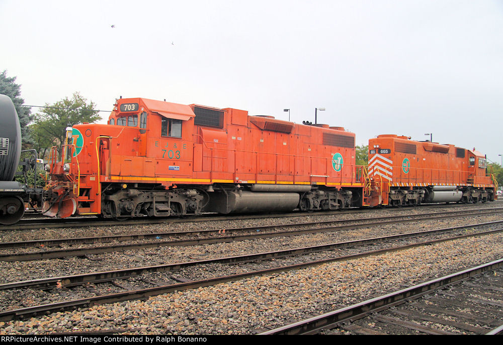 An EJ&E GP38  helps drill cars, while still wearing its large "The J" nose logo