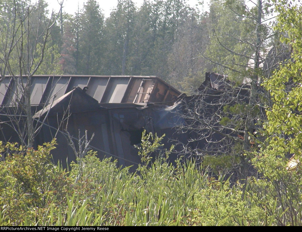 Loads piled at curve just west 