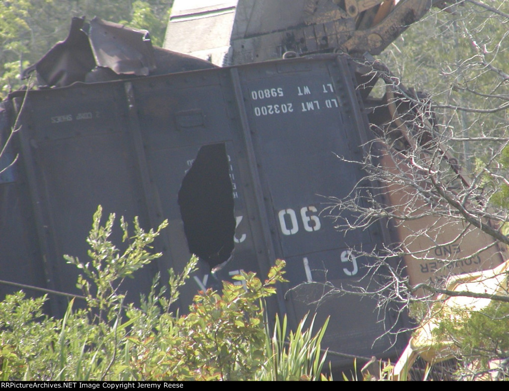 Hole in car derailed