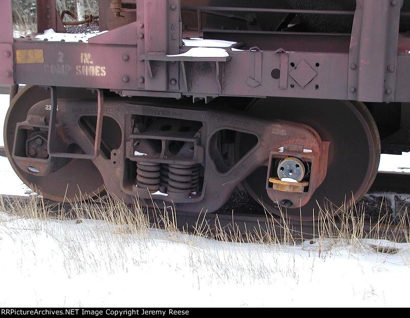 Rebuilt truck converted from friction to roller bearing