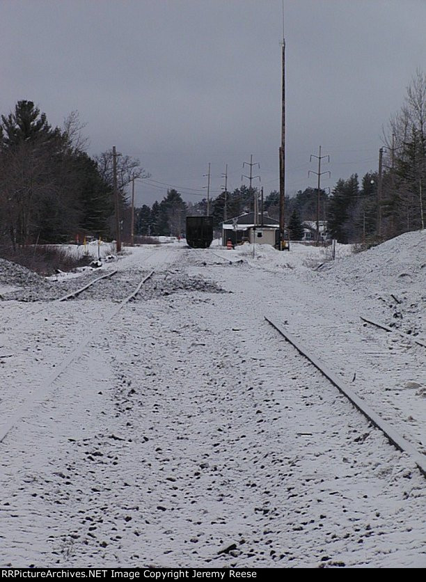 Mainline and siding obliterated, siding reopened first, mainline missing 100' of track