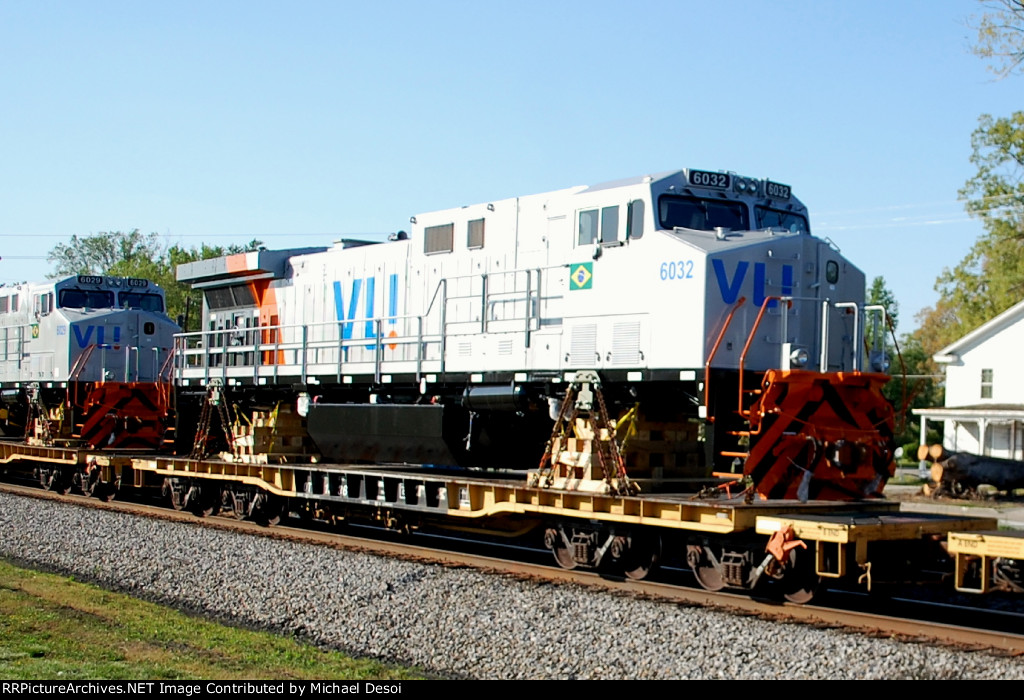 VLI BB40-9WM #6032 is one of 8 locomotives in this train heading east bound for the port of Norfolk VA, and then on to Brazil, seen here about to cross Maifield Ave.
