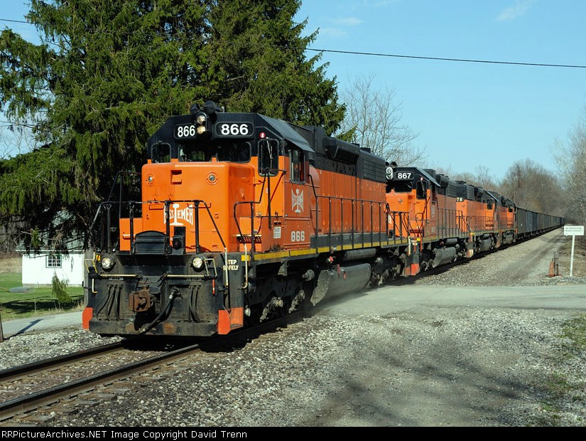 Northbound B&LE 866 crosses Huntley Rd