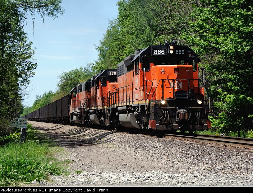 Southbound B&LE 866 leads sisters 878 and 867 pull their loads south towards Albion 
