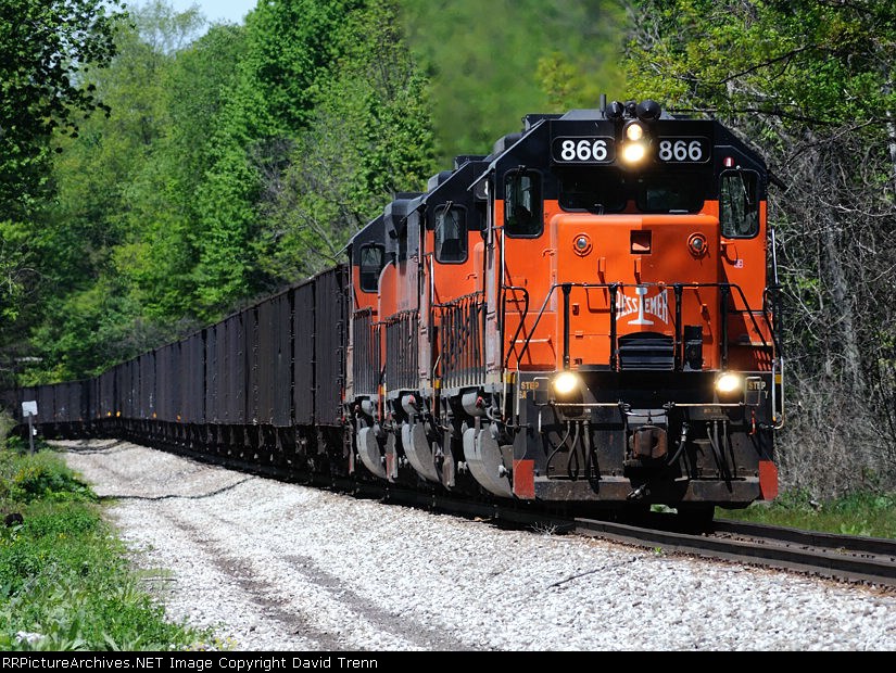 Southbound B&LE 866 leads sisters 878 and 867 pull their loads southward towards Albion as they approach Rt 215