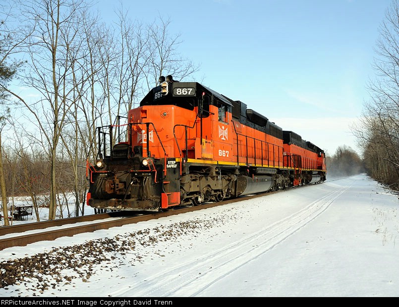 Northbound B&LE 867 and 905 approach Huntley Rd. kicking up a little snow in the process.