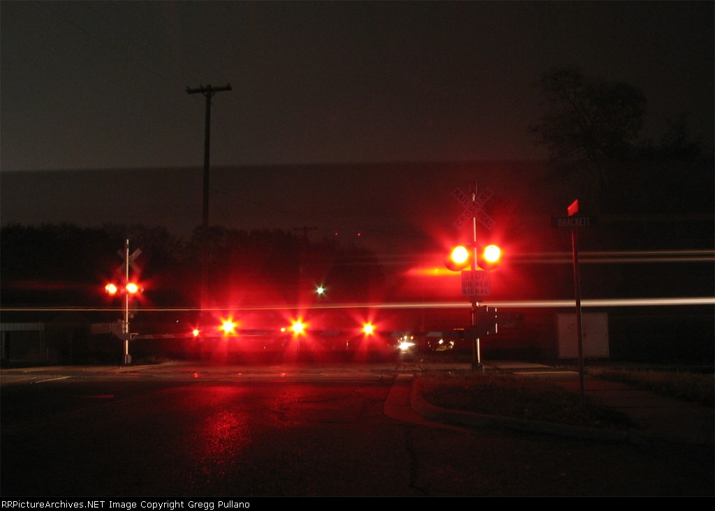 Eastbound Autorack Train crosses Seminary Street