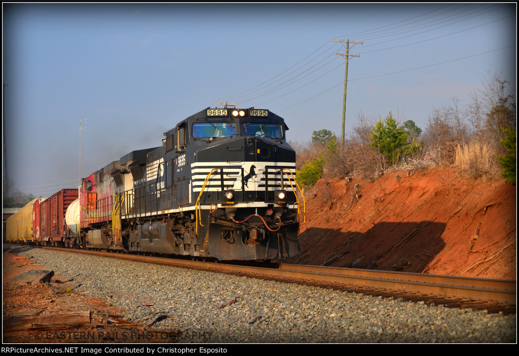 NS 9-40CW 9695 leads a BNSF GE on 337