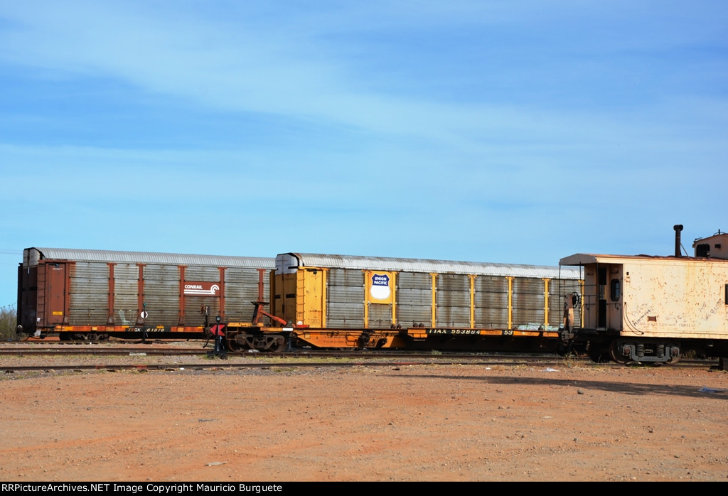 Autoracks, Spine cars and Caboose in Benjamin Hill yard
