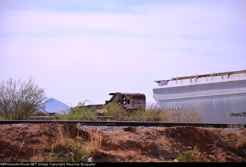 Former SBC MoW crane on rail cars cementery