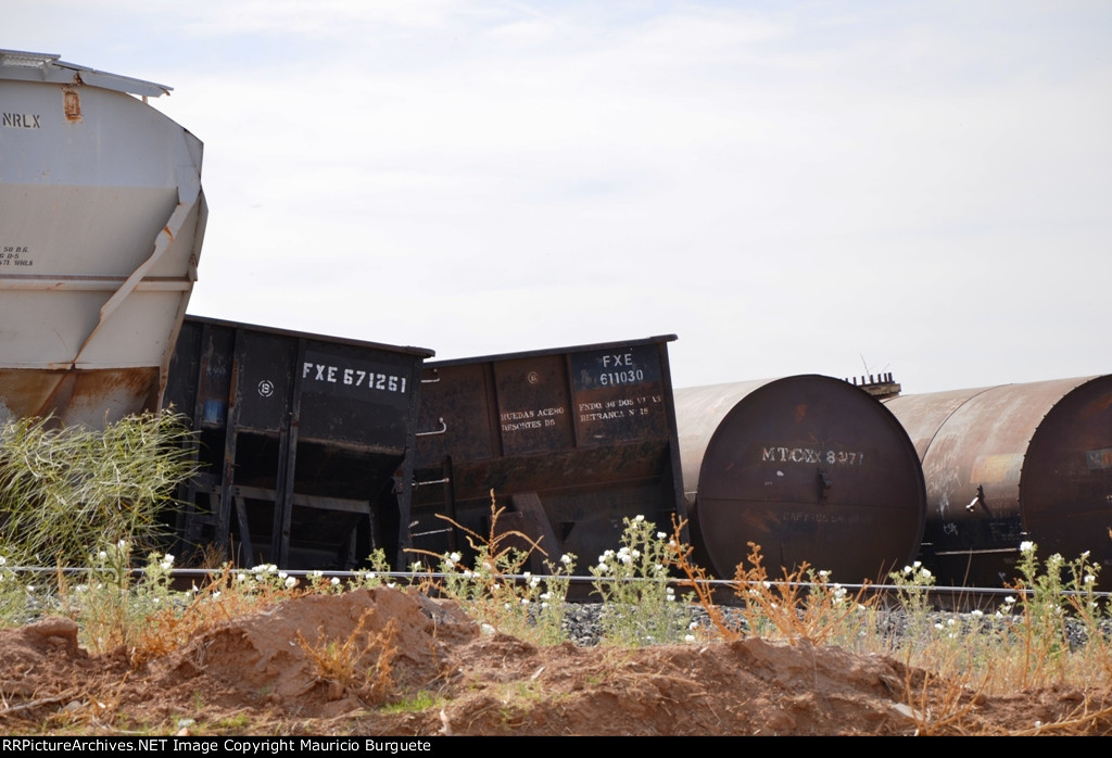 FXE Open Hoppers in rail car cementery