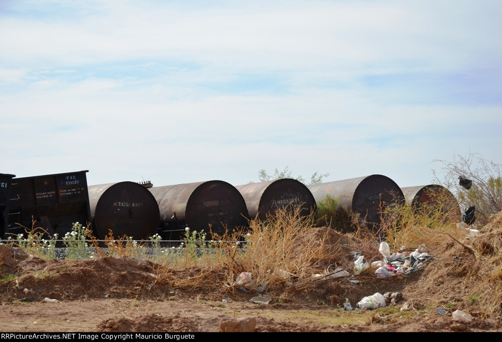 MTCX tanks in rail car cementery