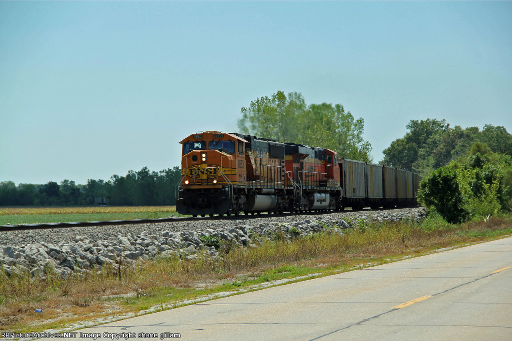 BNSF 8853 leads a nb empty coal,