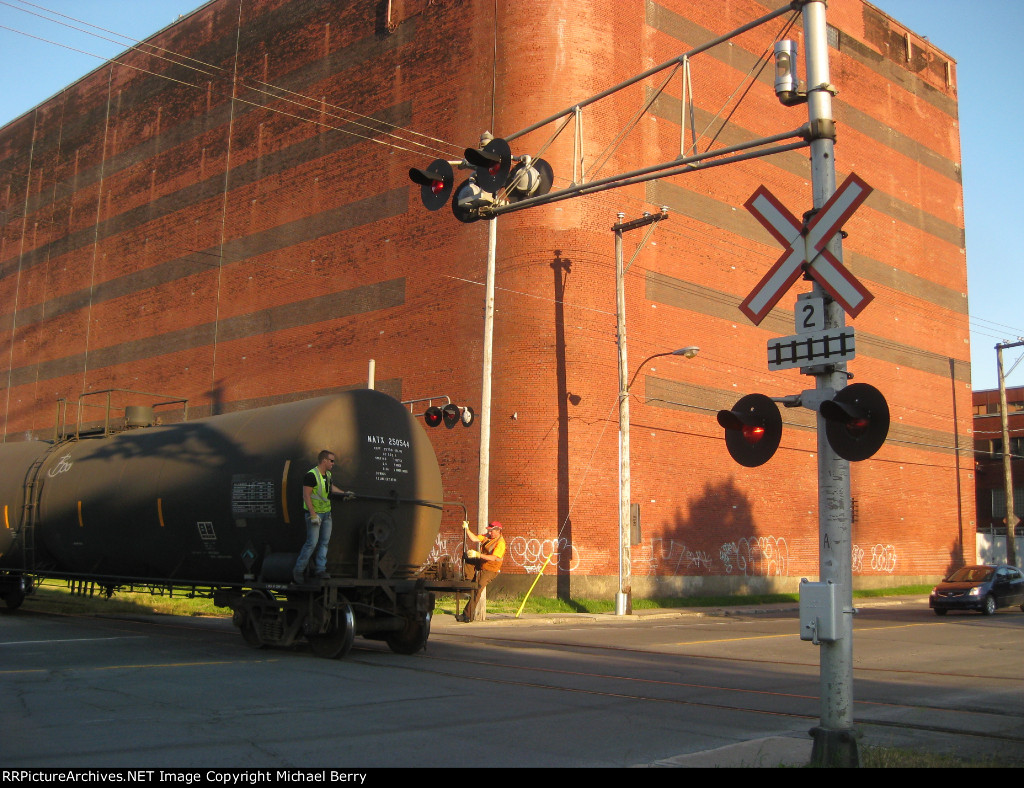 Tank cars crossing Lafleur Avenue in Lasalle, Qc.