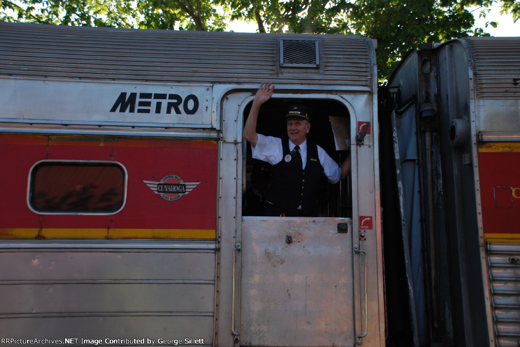 Conductor Alan waves us down the platform...