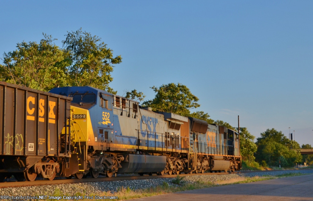 CSX 552 is in and out of shade.