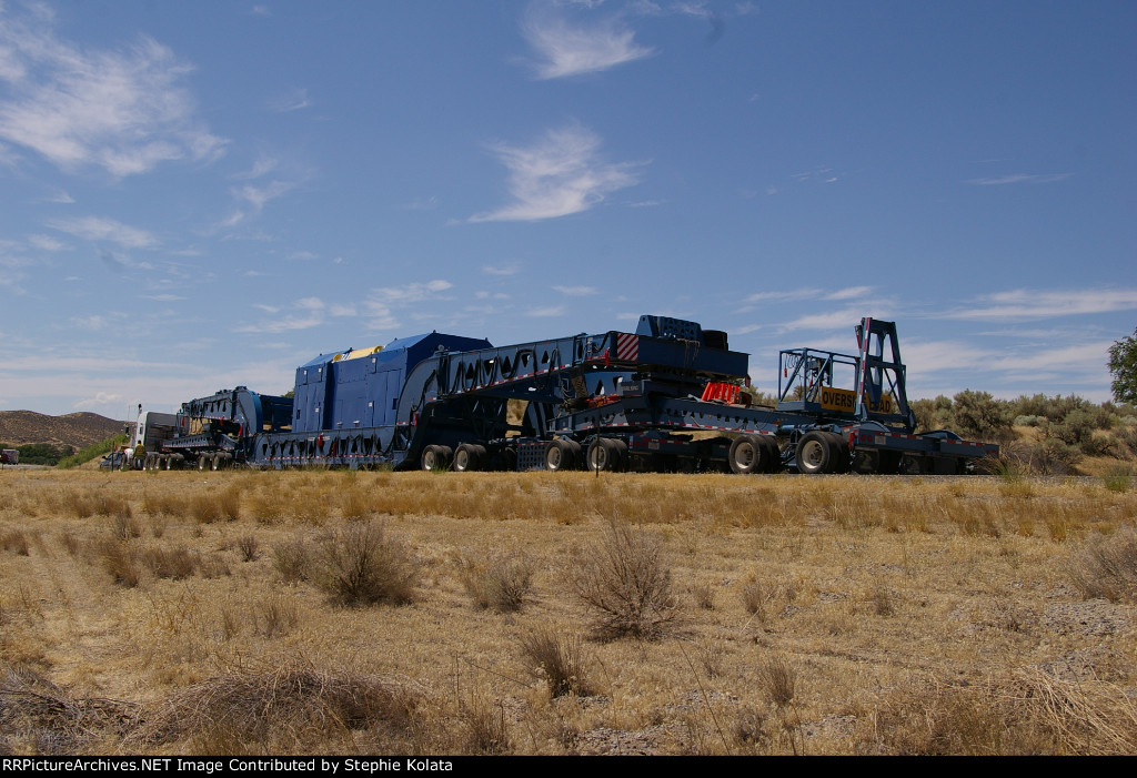 TOO BIG FOR THE RAILROAD TO HAUL ON 108 WHEEL HAULER TAKES 2 LANE OF THE RD