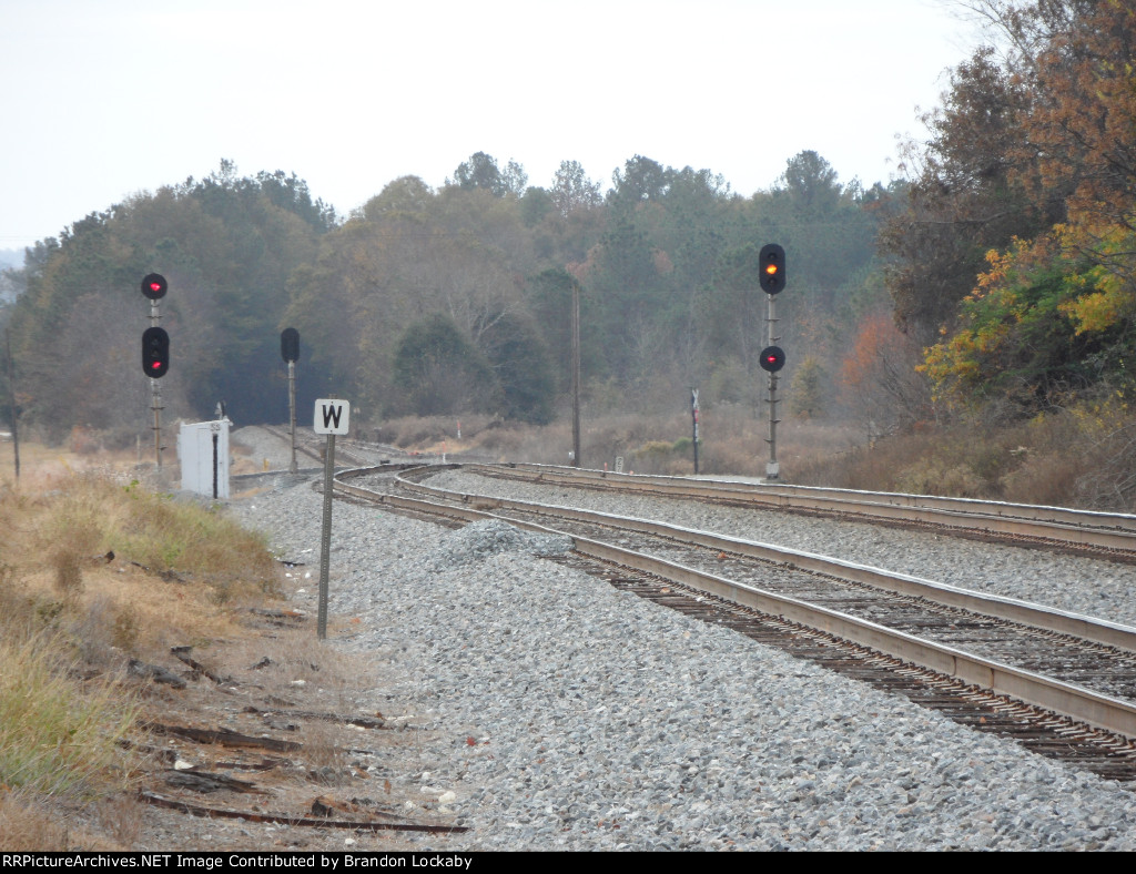 Approach on the main, stop at the Switch. 