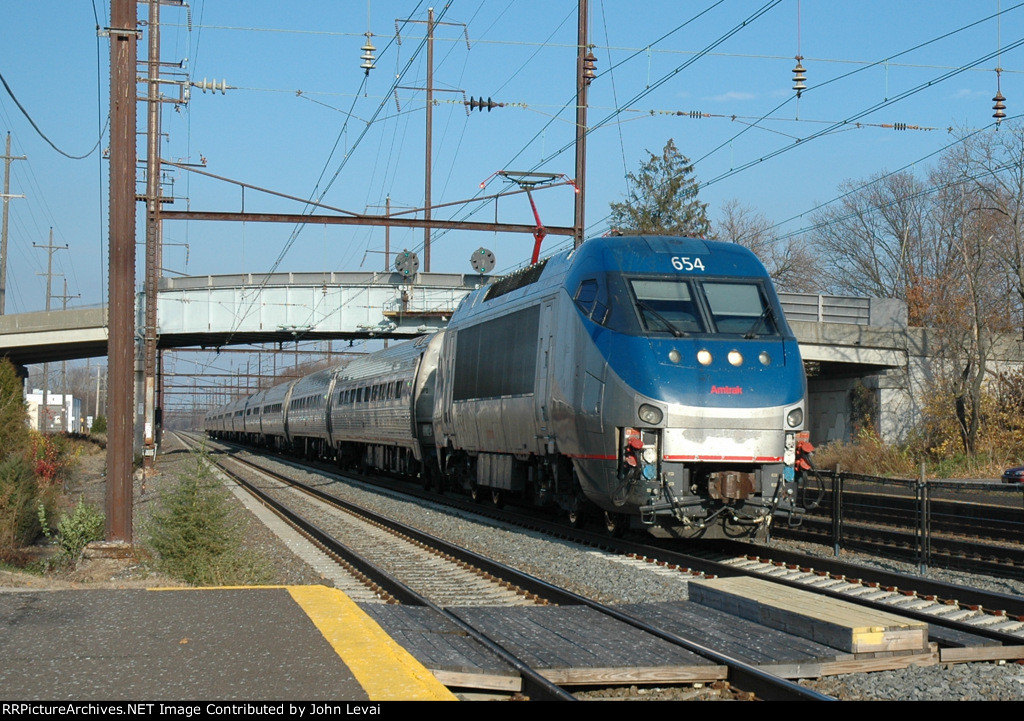 Amtk Train # 99 being led by an HHP-8