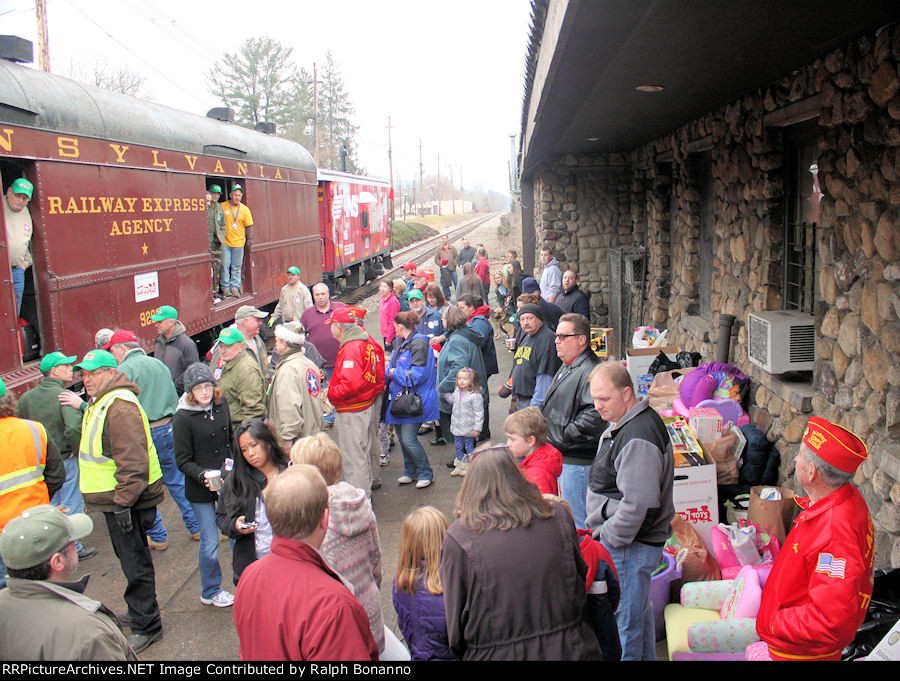 Some of the crowd wiaitng to make their donations. The town really came out and we collected 1700 toys here!!