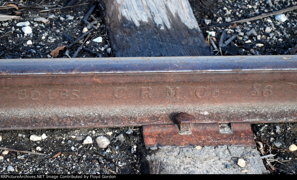 60 lbs C. R. M. Co. 1886 on siding