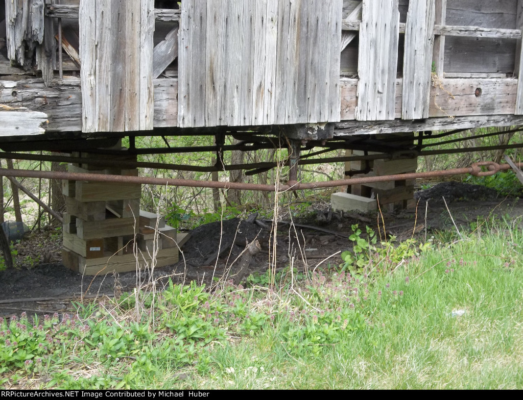 Wooden blocking is helping to correct #2's pronounced s`g 