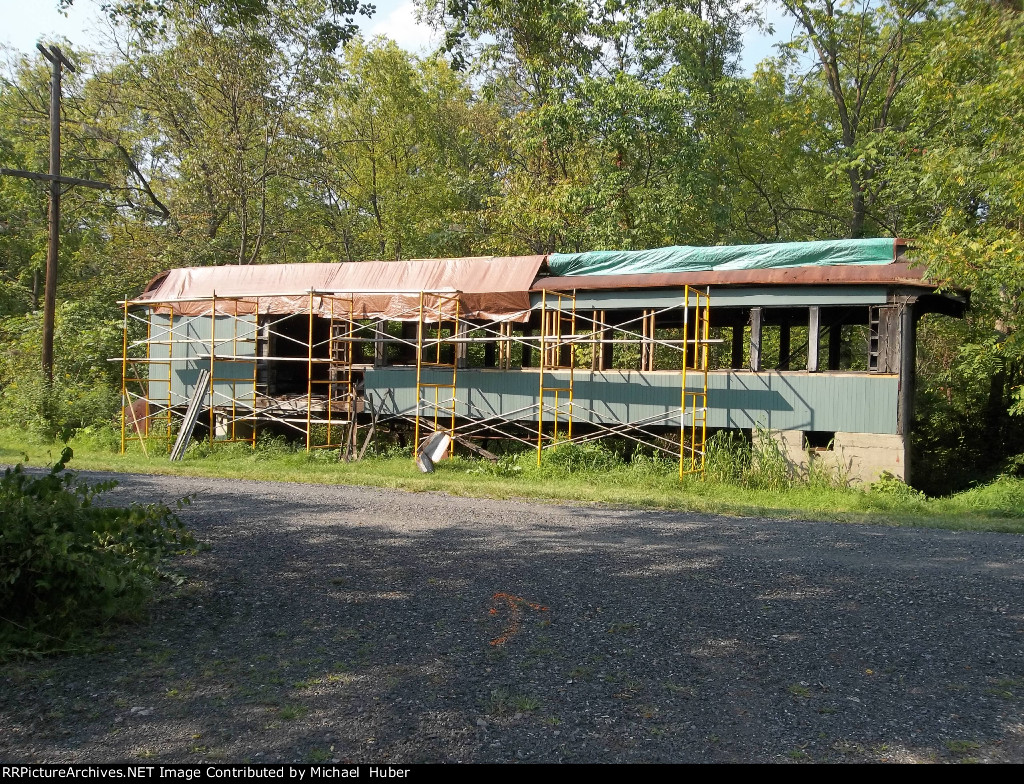 New wood siding is being installed on Ironton combine #2