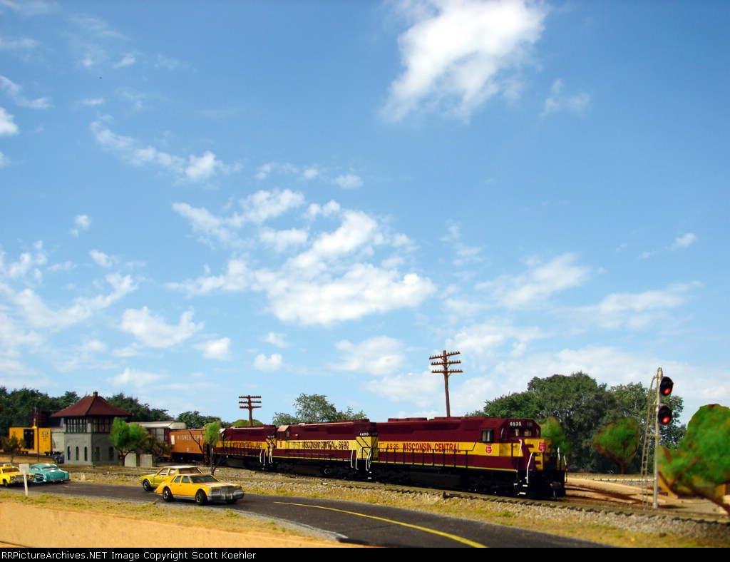 WC SD45 passing the tower
