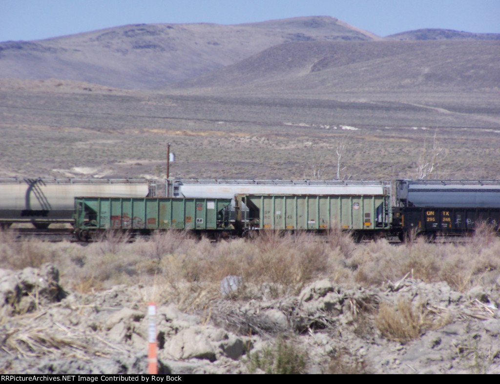 two UP hoppers and a GNTX gondola