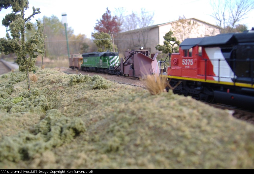 BN MOW crew waiting in the siding for the CN frieght to pass.