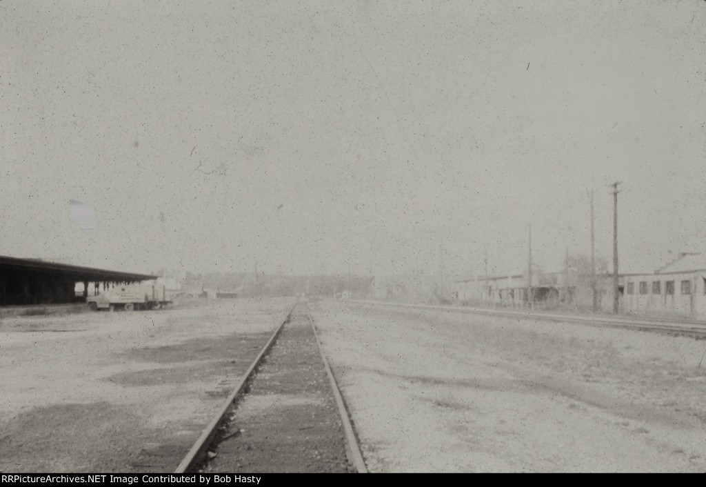 One station track remained. The mainline is to the right. (I had to turn this into B&W because of it's condition)