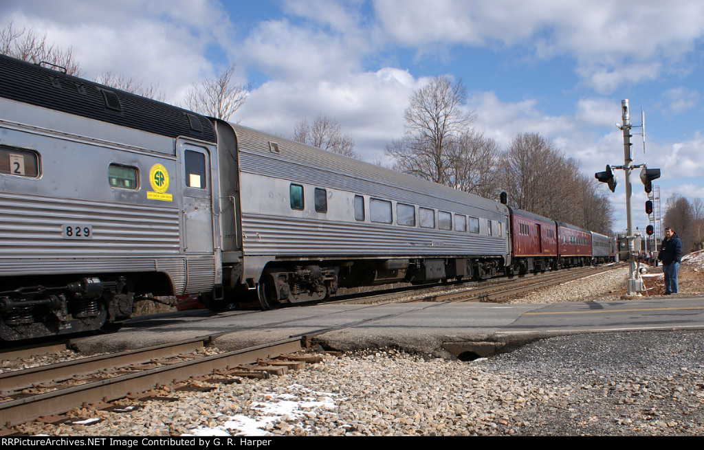 Steam in the 21st century passenger cars on the crossing that leads into the campus of Liberty University 