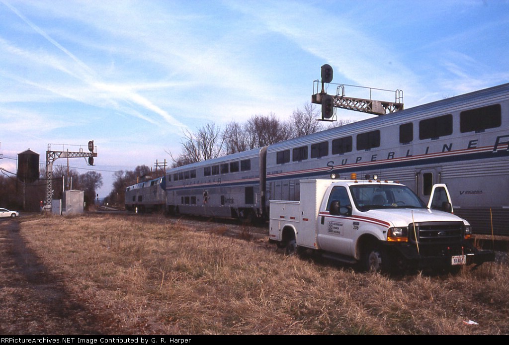 Auto Train with BBRR hi-rail truck nearby enters the "Straight Track"