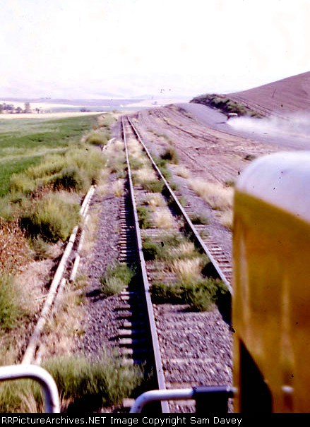 view from the cab of the 2054.  that my cousin to the right racing ahead for his next shot