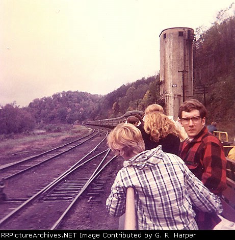 The Autumn Leaf Special with open-air cars leaving 