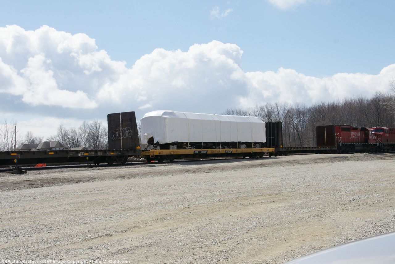 Special load - old passenger wrapped on flat in 255 