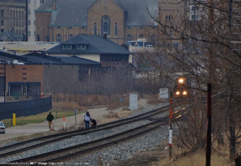 11 minutes after the last westbound, people have once again occupied the tracks.