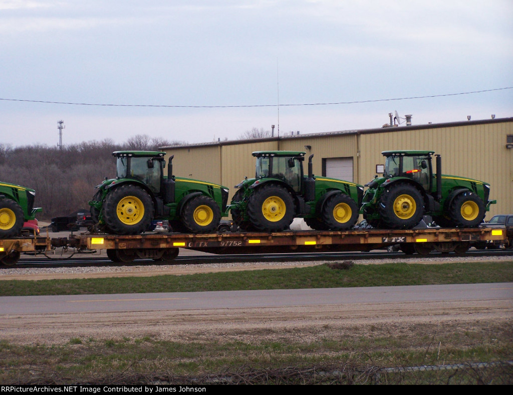 John Deere tractors leaving Iowa Northerns yard at Waterloo,IA