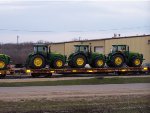 John Deere tractors leaving Iowa Northerns yard at Waterloo,IA