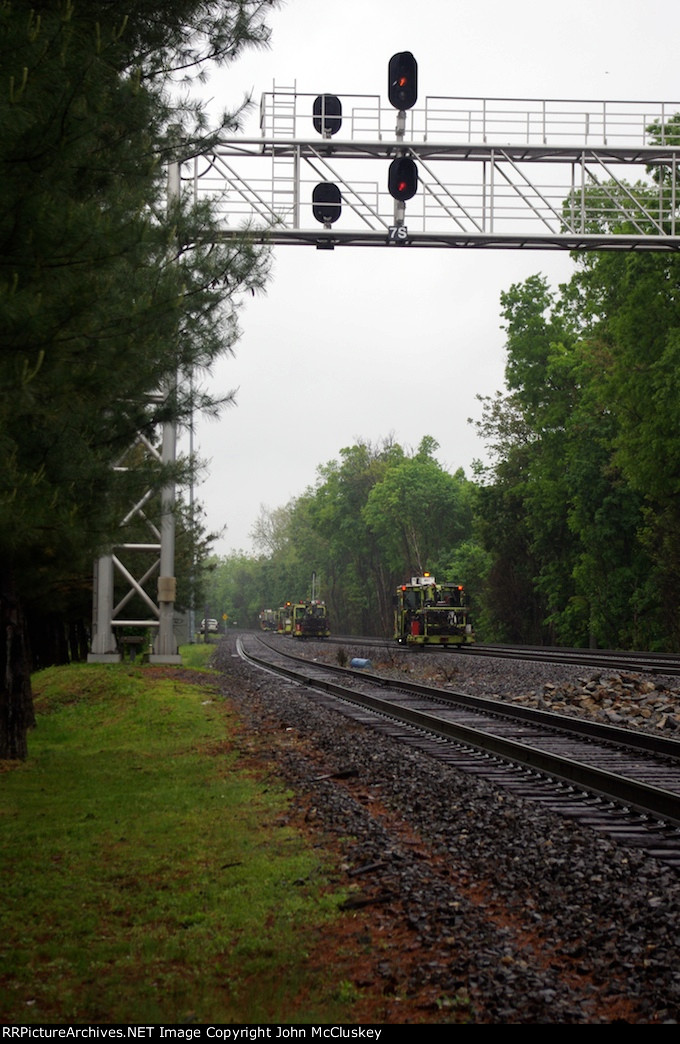 As the machines are unloaded, the gang rolls clear past CP7