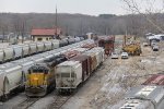 The IR's HLCX units sit tied down as Hulcher and BNSF crews work around the yard