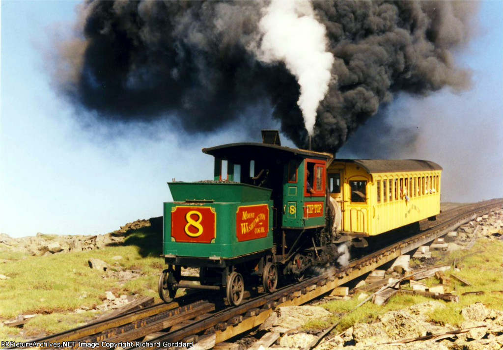 #8 Working Hard Pushing a coach up the mountain