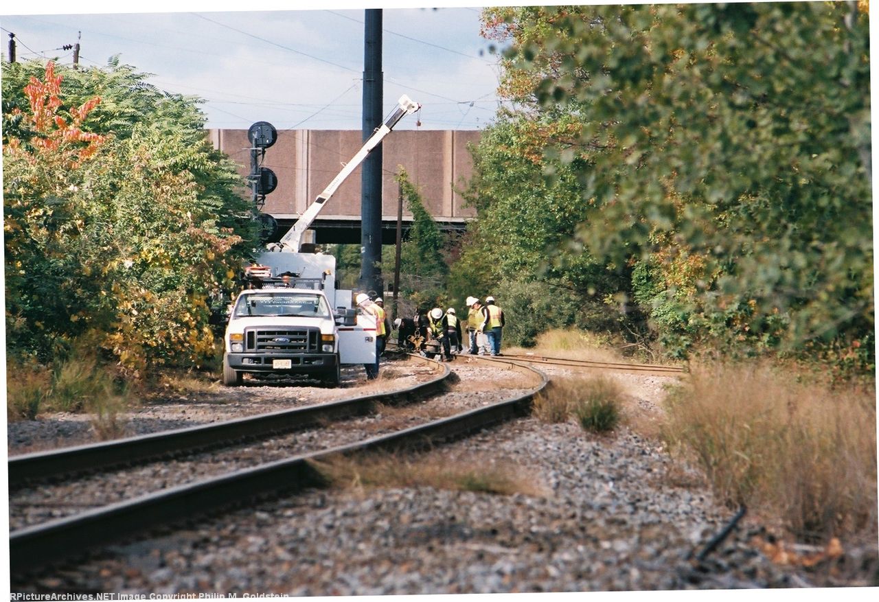 Track crews working on on of the wye legs at CP-PD looking west down the Port Reading Secondary