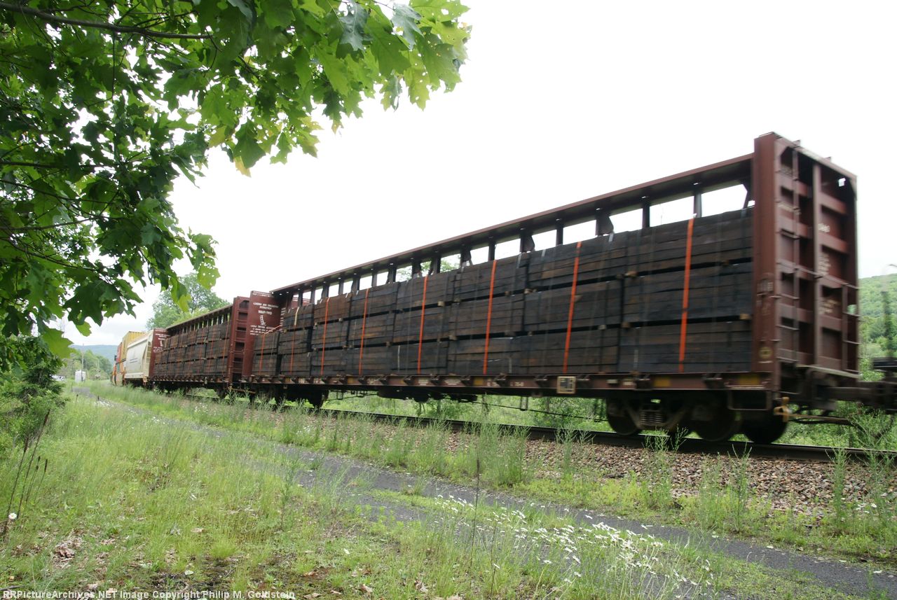 Railroad ties on plywood flatcars. Could they be destined for repairing the r.o.w. at the site of the 6/27/13 derailment at CSX CP188 - Fonda, NY?