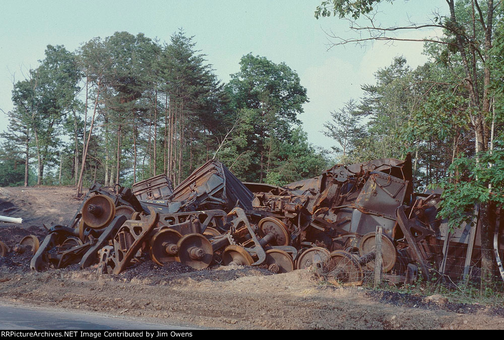 A coal train ran away on the steep downgrade and sharp curve descending to Cliffside Steam Station. Wreckage had covered Hwy 221. Here are some of the remains.