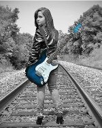 Senior photo on the tracks in Waddy,Ky. Right after I shot this a train came. She had a hard time getting off the tracks in those shoes!