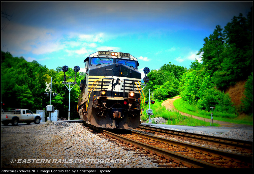 NS 9911 leads an eastbound coal drag