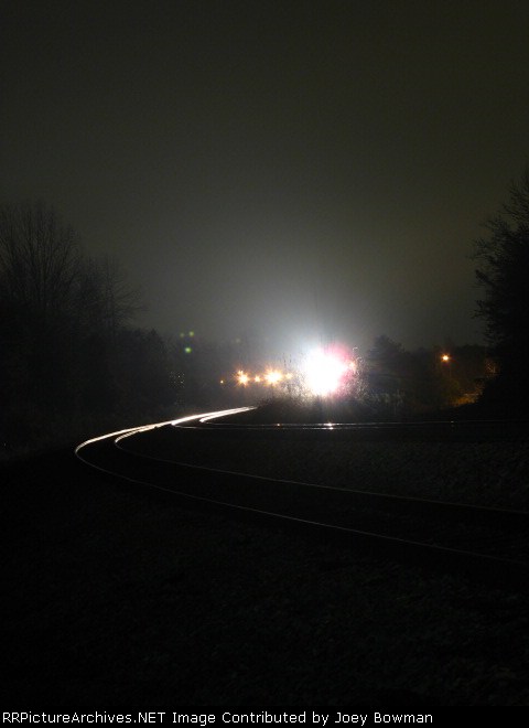 NS train sitting in yard, about 1/3 of a mile away or so.