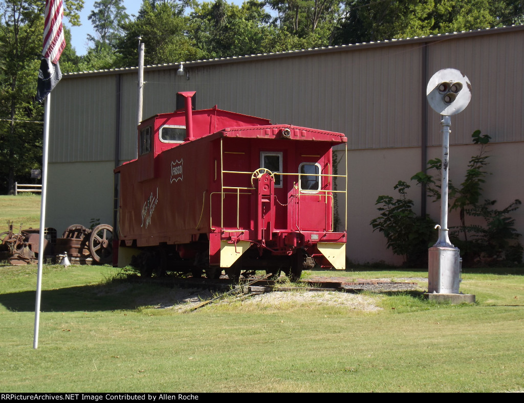 Frisco Caboose next to old signal