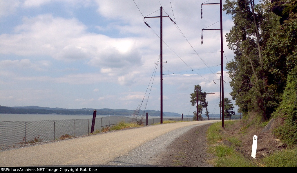 The old white PRR Milepost No. 32 along the rail-trail